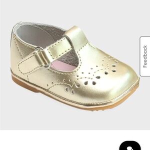 L'Amour Shoes metallic leather Mary Jane with full-brogue detailing.